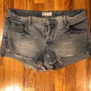 Distressed button up jean shorts